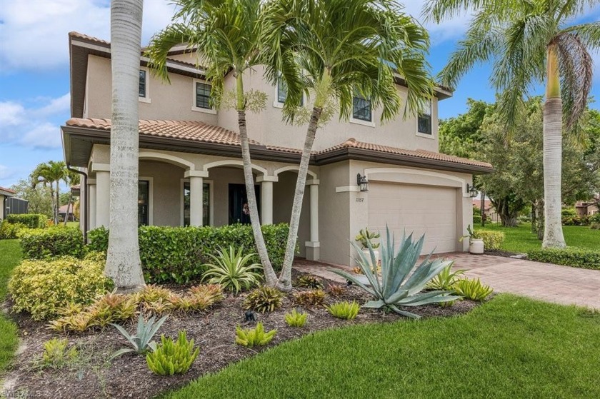 This luxurious Newport model home in the sought-after Paloma - Beach Home for sale in Bonita Springs, Florida on Beachhouse.com