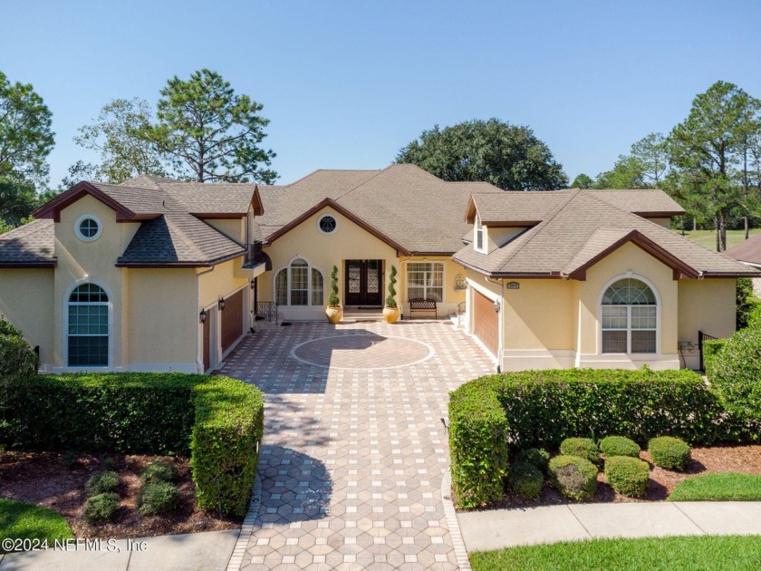 An EXQUISITE custom home in the PRESTIGIOUS gated community of - Beach Home for sale in Jacksonville, Florida on Beachhouse.com