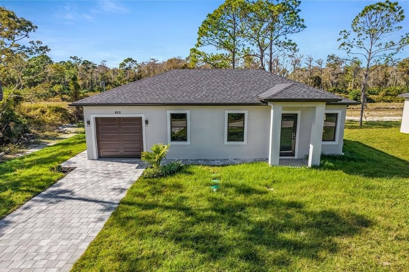 Brand-new construction! This beautifully crafted home, 3 bedroom - Beach Home for sale in Lehigh Acres, Florida on Beachhouse.com