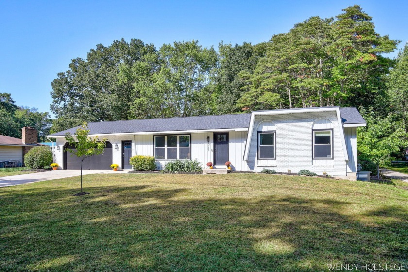 Live where others vacation! Welcome to this beautifully updated - Beach Home for sale in Holland, Michigan on Beachhouse.com