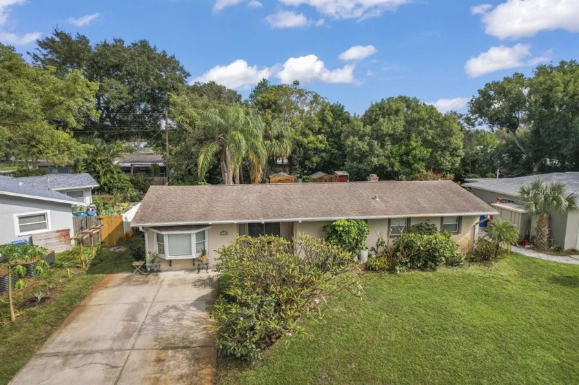 This grand home has 4 bedrooms, 3 full baths, 1 extra large room - Beach Home for sale in St. Petersburg, Florida on Beachhouse.com