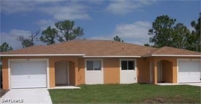 Spacious three bedroom, two bath plus garage duplex in Lehigh - Beach Home for sale in Lehigh Acres, Florida on Beachhouse.com