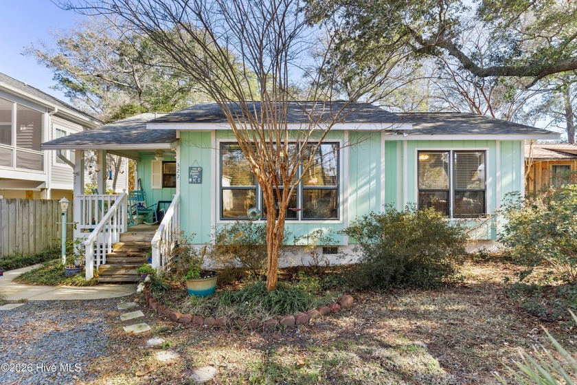 This gem is tucked away on a quiet street, footsteps from the - Beach Home for sale in Oak Island, North Carolina on Beachhouse.com