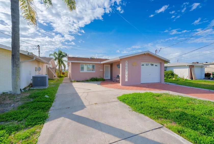 WATERFRONT HOME WITH PRIVATE BOAT DOCK AND 4 BOAT LIFTS!!! Plus - Beach Home for sale in New Port Richey, Florida on Beachhouse.com