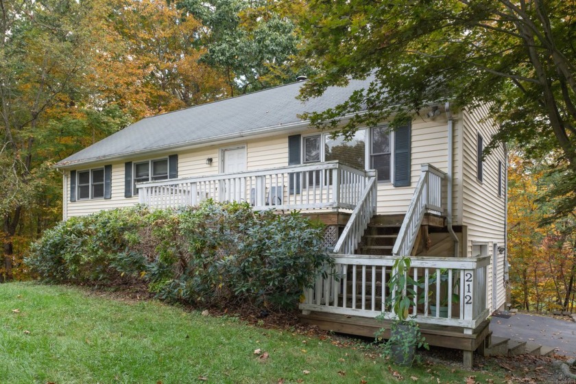 Nestled in the charming lake community of Guilford, CT, this - Beach Home for sale in Guilford, Connecticut on Beachhouse.com