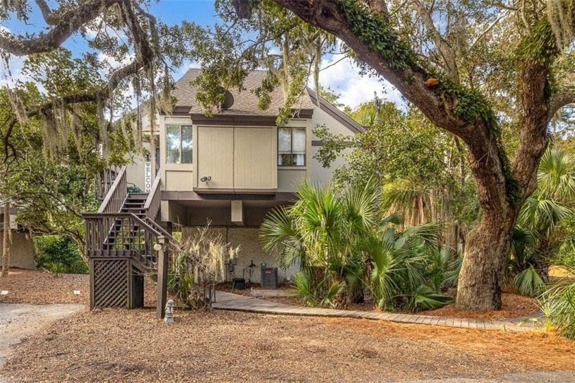 Nestled beneath the sprawling oaks of the sought-after Cedar - Beach Condo for sale in Saint Simons, Georgia on Beachhouse.com