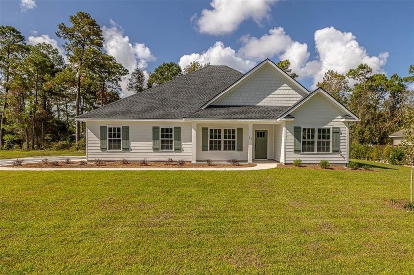 GORGEOUS NEW CONSTRUCTION ON PRIVATE WOODED LOT IN BEAUTIFUL - Beach Home for sale in Brunswick, Georgia on Beachhouse.com