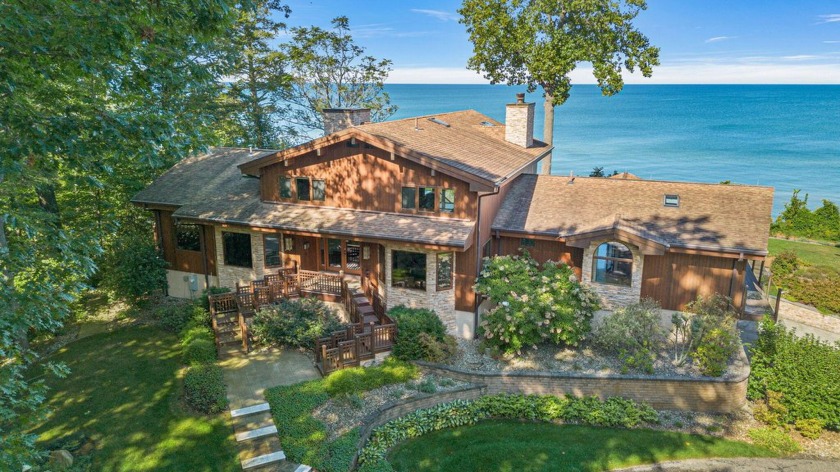 Experience the pinnacle of lakeside living in this custom Lindal - Beach Home for sale in Coloma, Michigan on Beachhouse.com