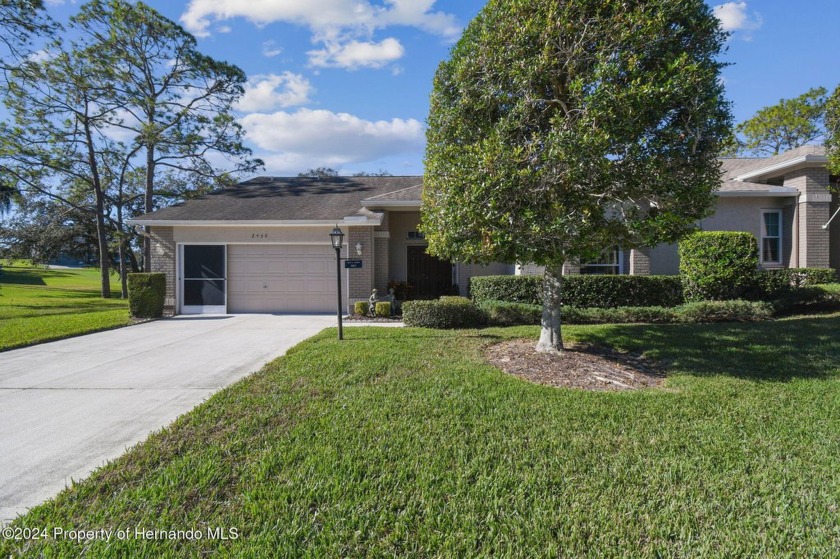 Beautiful OAKMONT MODEL Expanded End Unit VILLA in AWARD WINNING - Beach Home for sale in Spring Hill, Florida on Beachhouse.com