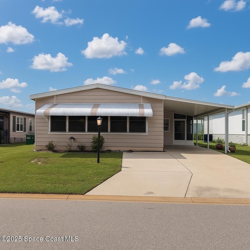 Own a piece of paradise in the resort-style community of - Beach Home for sale in Barefoot Bay, Florida on Beachhouse.com