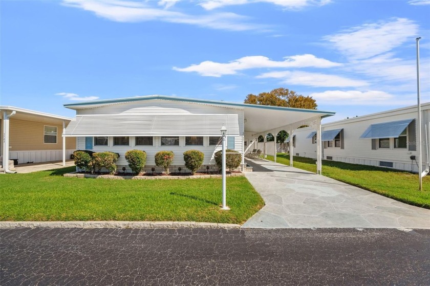OWN THE LAND! NO lot rent! Low taxes and LOW HOA. Lake Conley is - Beach Home for sale in Holiday, Florida on Beachhouse.com