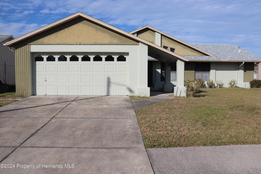 COME CHECK OUT THIS CHARMING 3 BEDROOM 2 BATH HOME IN THE - Beach Home for sale in Port Richey, Florida on Beachhouse.com