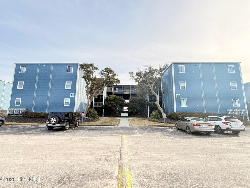 Nestled along the serene shores of North Topsail Beach, this - Beach Condo for sale in North Topsail Beach, North Carolina on Beachhouse.com