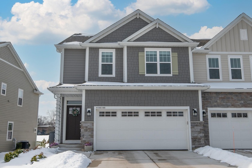 Better than new and move-in ready with $60k+ in upgrades! This - Beach Home for sale in Cedarburg, Wisconsin on Beachhouse.com