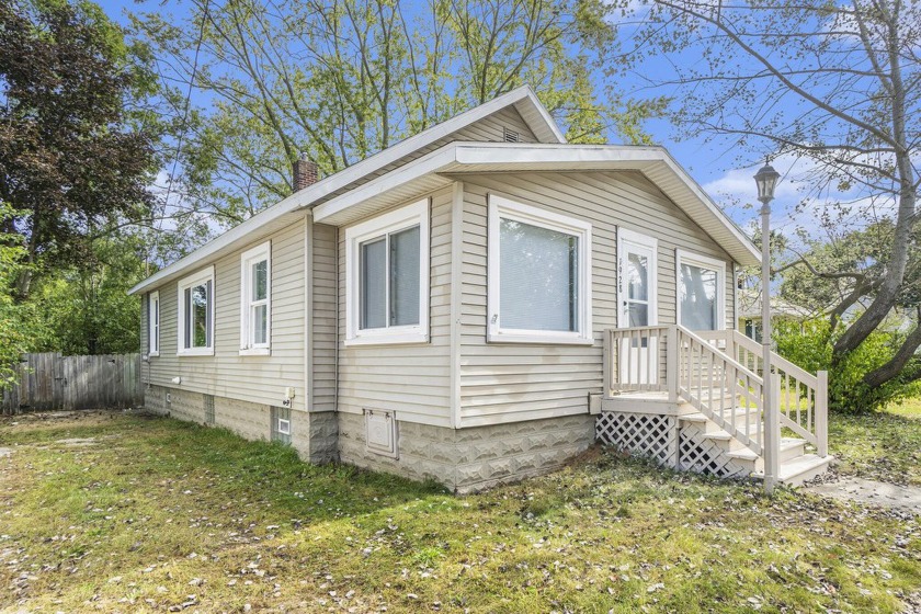 Welcome to 1928 Hudson Street, a beautifully renovated 3-bedroom - Beach Home for sale in Muskegon, Michigan on Beachhouse.com