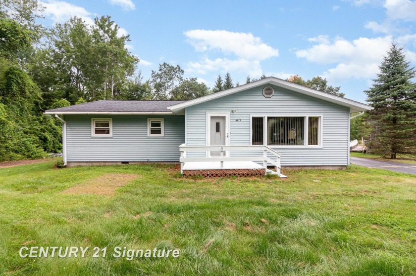 Discover this delightful ranch-style home located right across - Beach Home for sale in Au Gres, Michigan on Beachhouse.com