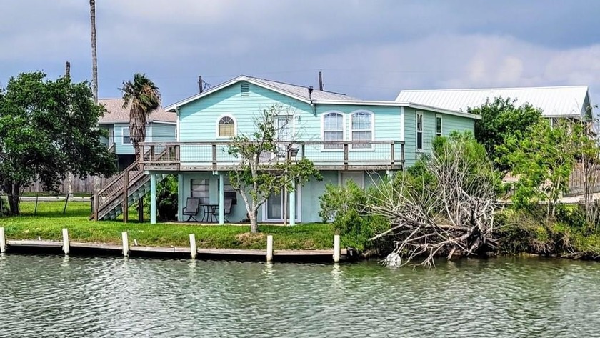 Your Coastal Getaway Awaits! Tucked just off Copano Bay with - Beach Home for sale in Rockport, Texas on Beachhouse.com