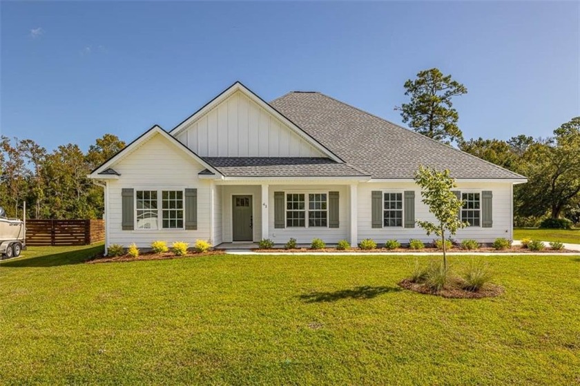 GORGEOUS NEW CONSTRUCTION ON THE LAKE IN BEAUTIFUL GATED - Beach Home for sale in Brunswick, Georgia on Beachhouse.com