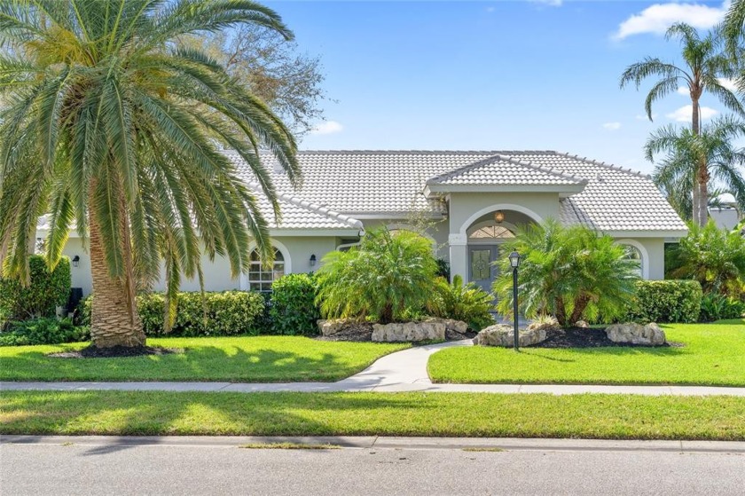 This STUNNING and well maintained pool home on a corner lot in - Beach Home for sale in Nokomis, Florida on Beachhouse.com