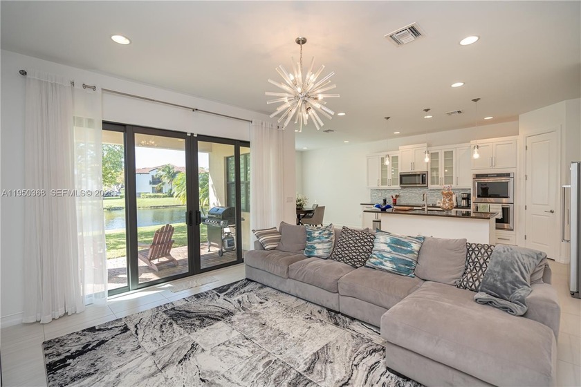 Enjoy refined single-family living with serene, unobstructed - Beach Home for sale in Pembroke Pines, Florida on Beachhouse.com