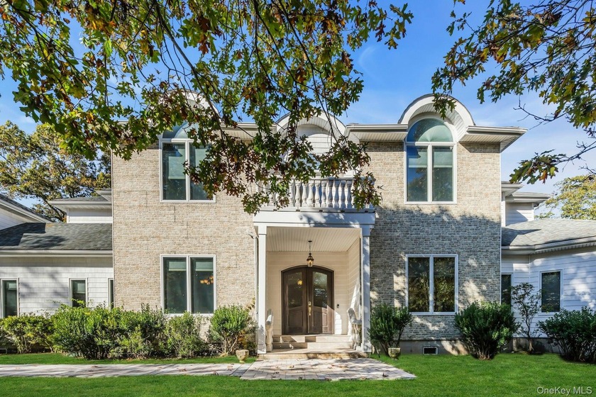 Discover your dream Hamptons retreat in this exceptional five - Beach Home for sale in Hampton Bays, New York on Beachhouse.com