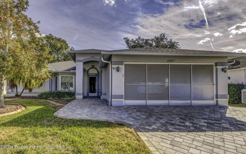 This immaculate two-bedroom, two-bathroom home with a two-car - Beach Home for sale in Spring Hill, Florida on Beachhouse.com