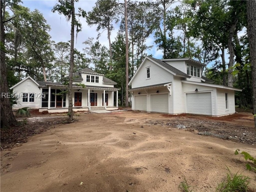 NEW CONSTRUCTION by Artisan Custom Homes! Situated on a private - Beach Home for sale in Okatie, South Carolina on Beachhouse.com