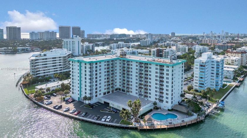 Discover the largest 1 bed, 1 bath model with a den at Island - Beach Condo for sale in Bay Harbor Islands, Florida on Beachhouse.com