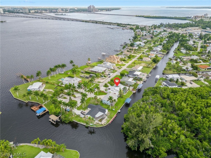 Seize this rare opportunity to live in a Gulf-access, waterfront - Beach Home for sale in North Fort Myers, Florida on Beachhouse.com