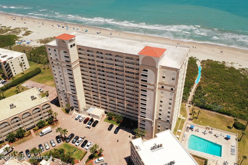 Live the coastal lifestyle in this 2 bed/2 bath Sand Dollar open - Beach Condo for sale in Cocoa Beach, Florida on Beachhouse.com