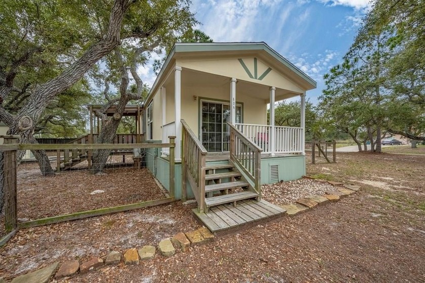Welcome to your laid-back coastal escape. Set on a spacious - Beach Home for sale in Rockport, Texas on Beachhouse.com