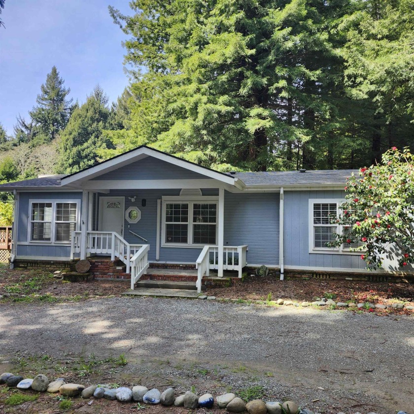 A beautiful, spacious home in the redwoods, near town and - Beach Home for sale in Crescent City, California on Beachhouse.com