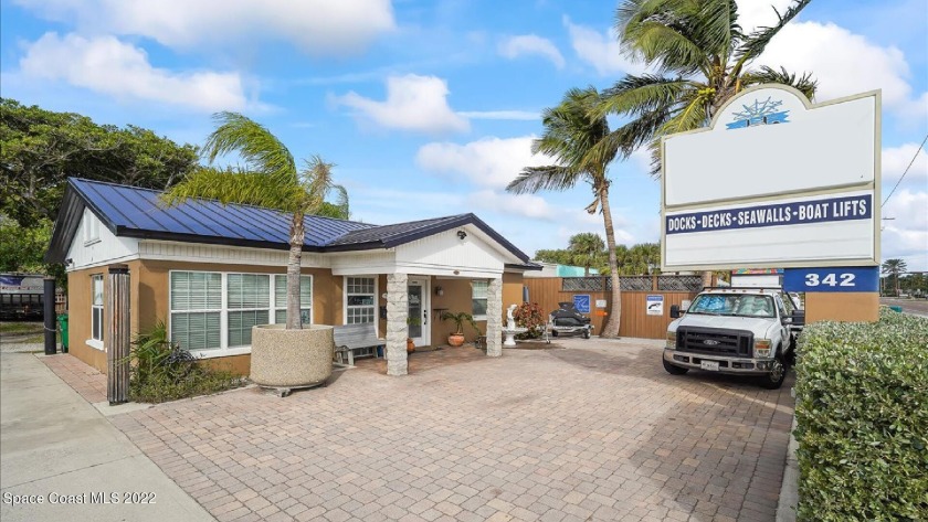 This 40 year-old, highly successful dock & deck company located - Beach Commercial for sale in Cocoa Beach, Florida on Beachhouse.com