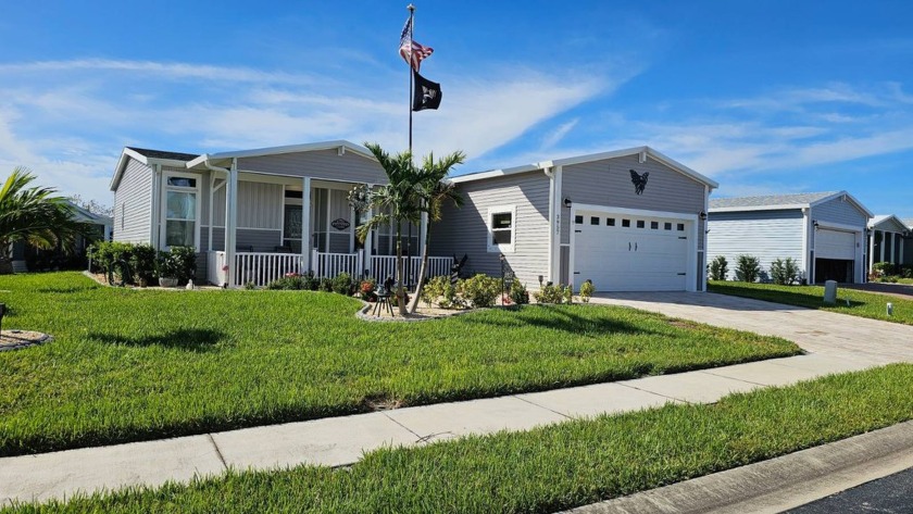 ABSOLUTELY STUNNING! This 2023 Palm Harbor Ventura Model home is - Beach Home for sale in Ruskin, Florida on Beachhouse.com