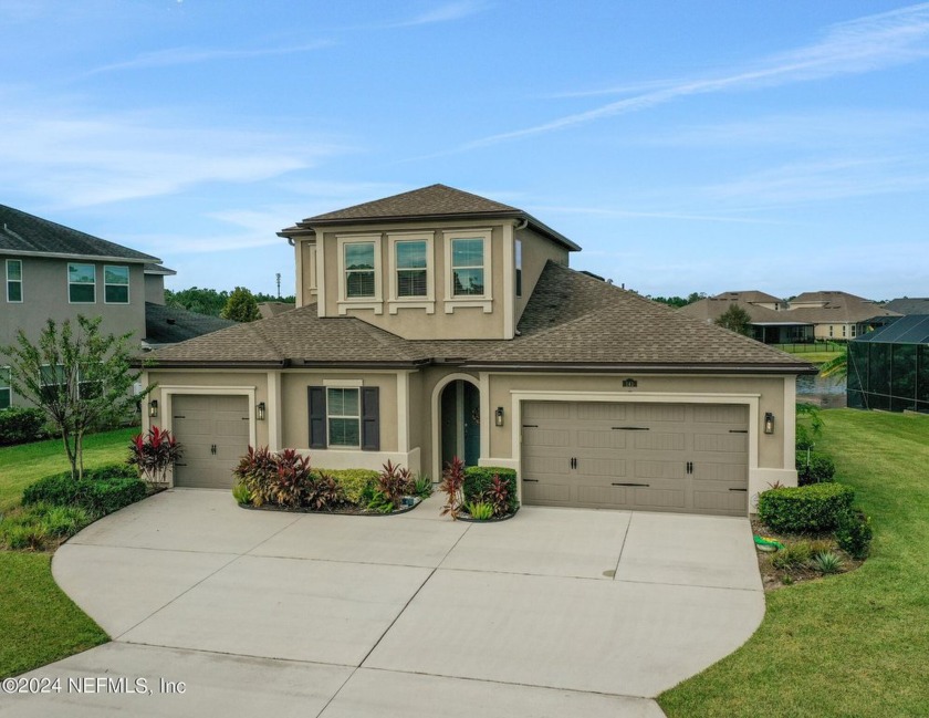 Welcome to this stunning 4 bedroom, 4 bathroom home nestled in - Beach Home for sale in Saint Johns, Florida on Beachhouse.com