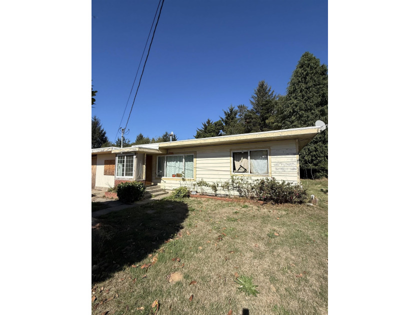 Opportunity awaits! This 4-bedroom, 2-bath home offers - Beach Home for sale in Crescent City, California on Beachhouse.com