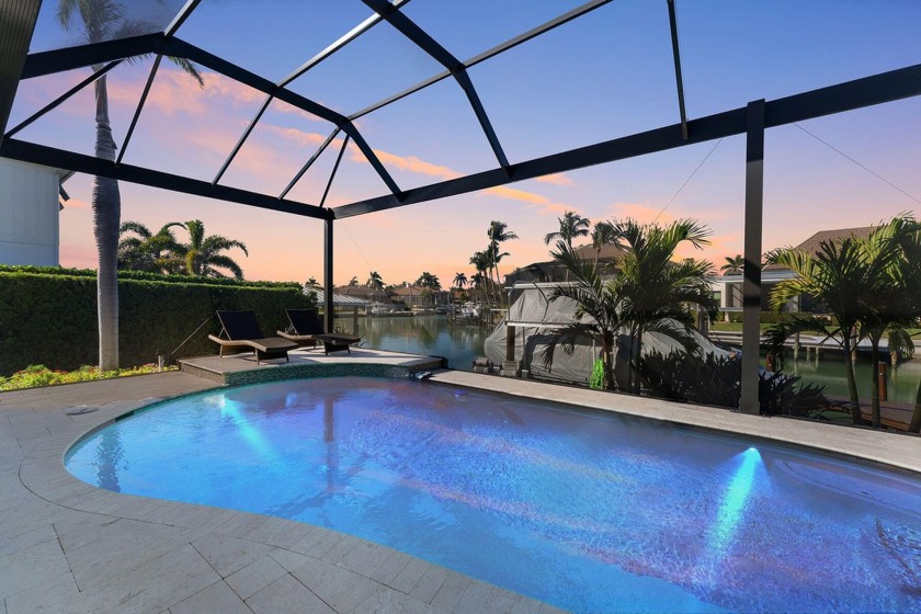 Discover the epitome of island elegance in this immaculate, RK - Beach Home for sale in Marco Island, Florida on Beachhouse.com