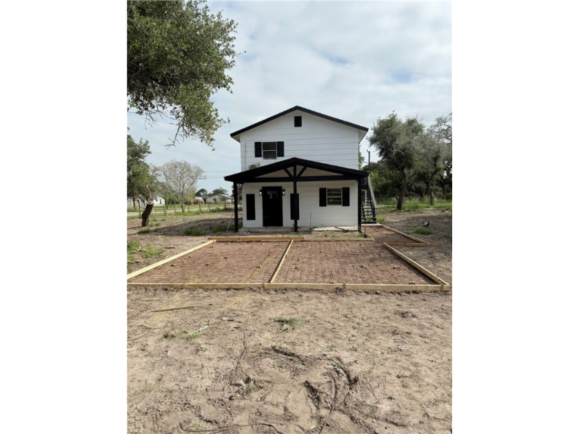 This corner property, featuring a spacious double lot that has - Beach Home for sale in Aransas Pass, Texas on Beachhouse.com