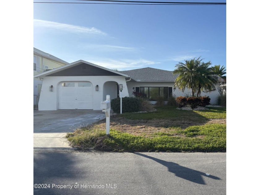 Unlock the potential of this waterfront property in a - Beach Home for sale in Hernando Beach, Florida on Beachhouse.com