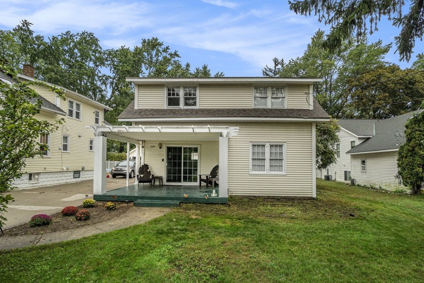 This charming, fully renovated home offers an open floor plan - Beach Home for sale in Holland, Michigan on Beachhouse.com