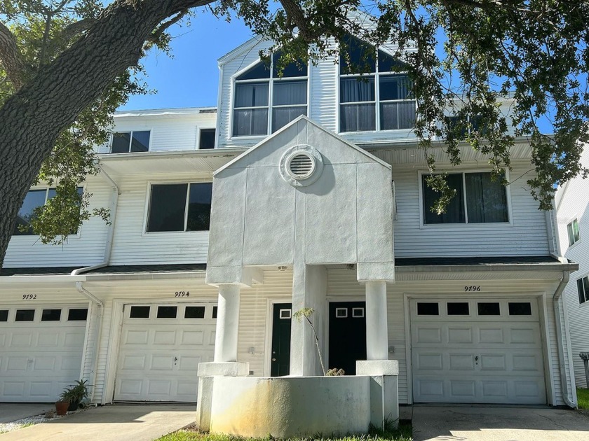 Discover a unique opportunity to acquire two adjoining tri-level - Beach Townhome/Townhouse for sale in Seminole, Florida on Beachhouse.com