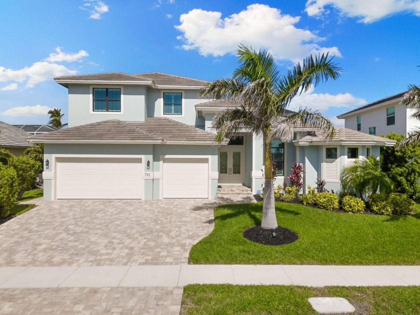 Luxury Waterfront Living with Indirect Gulf Access! Experience - Beach Home for sale in Marco Island, Florida on Beachhouse.com