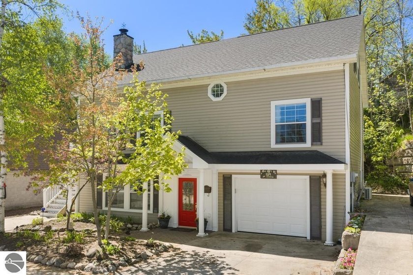 This exceptional custom-built 3BR/4BA residence offers 3,200+ sq - Beach Home for sale in Charlevoix, Michigan on Beachhouse.com