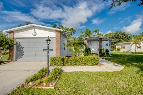 This stunning, fully furnished home in the desirable Pine Lakes - Beach Home for sale in North Fort Myers, Florida on Beachhouse.com