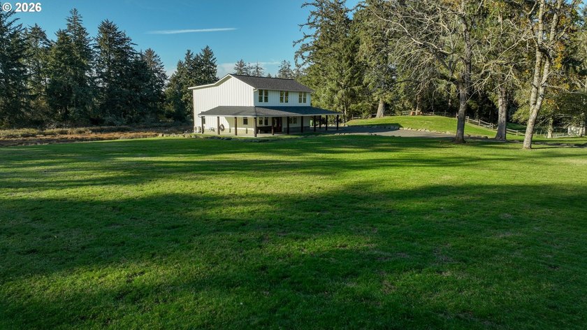 Stunning custom farmhouse on a beautiful lake in the heart of - Beach Home for sale in Warrenton, Oregon on Beachhouse.com