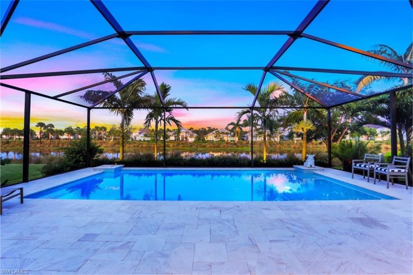 Panoramic lake views from the expansive marble lanai complete - Beach Home for sale in Naples, Florida on Beachhouse.com