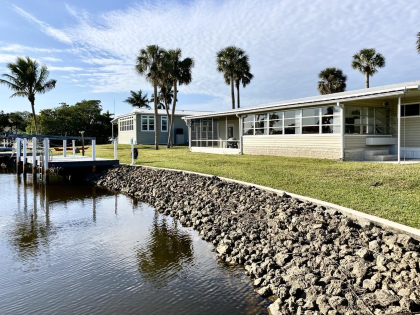 100 ft of WATER FRONT with INDIRECT GULF ACCESS + EXTRA LARGE - Beach Home for sale in Naples, Florida on Beachhouse.com