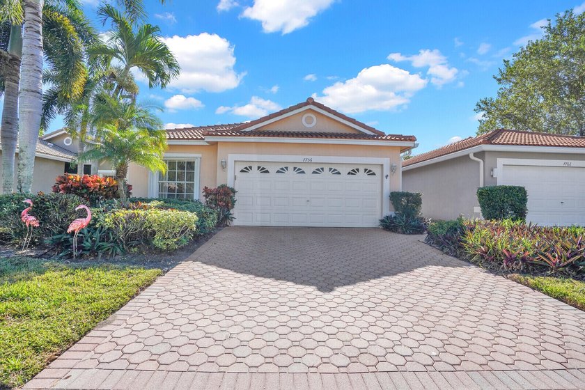Featuring a 2021 roof, new A/C, full hurricane shutters, updated - Beach Home for sale in Boynton Beach, Florida on Beachhouse.com