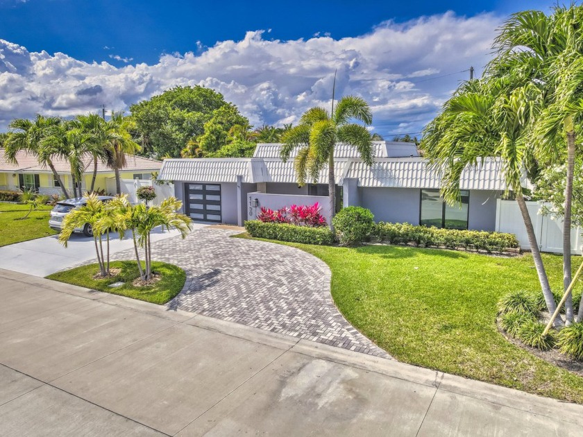 Expanded and remodeled home in beautiful Yacht Harbor Manor on - Beach Home for sale in Singer Island, Florida on Beachhouse.com