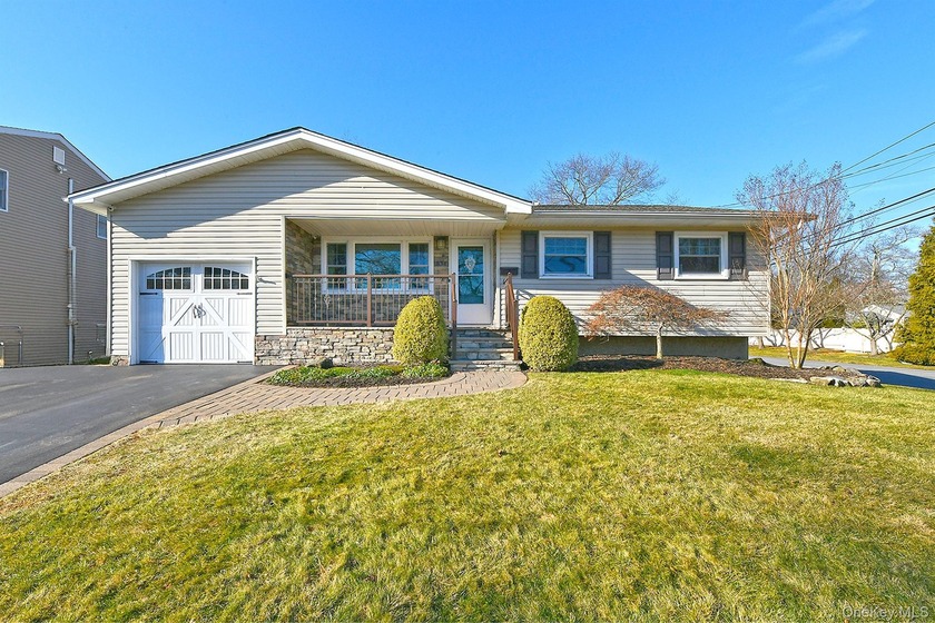 Located in the Pine Lake area of West Islip, this meticulously - Beach Home for sale in West Islip, New York on Beachhouse.com